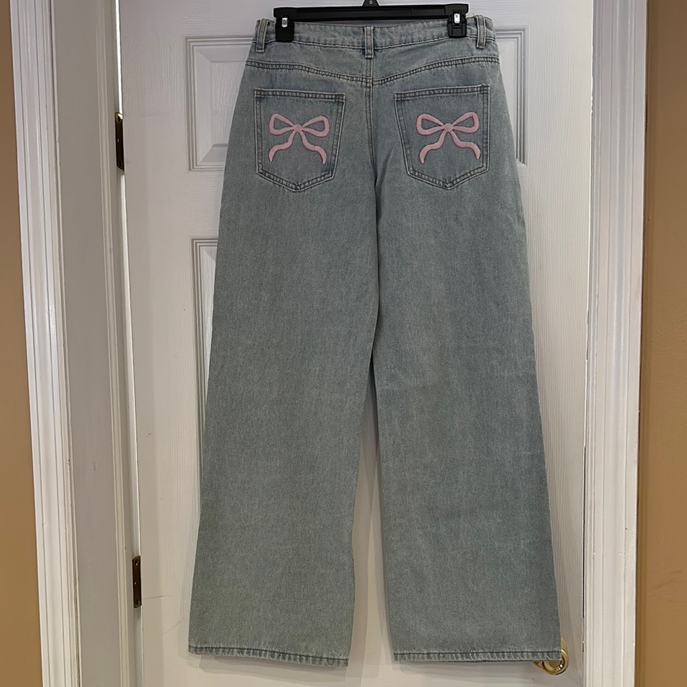 Edikted Blue and Pink Flare Jeans with Playful Accents
